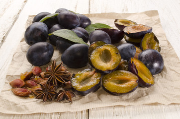 cut plums and star anise