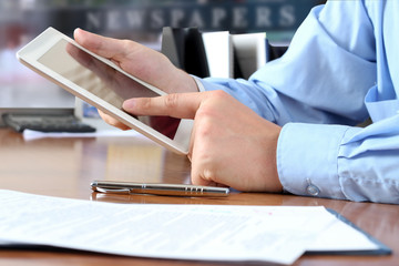 businessman  doing business, sitting at his desk in the office,