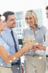 Composite image of business team toasting with champagne