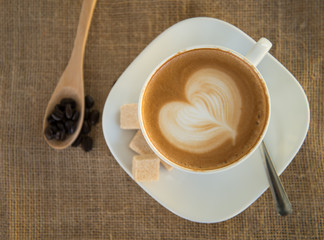 Cappuccino or latte coffee with heart shape