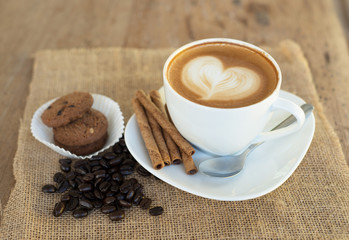 Cappuccino or latte coffee with heart shape