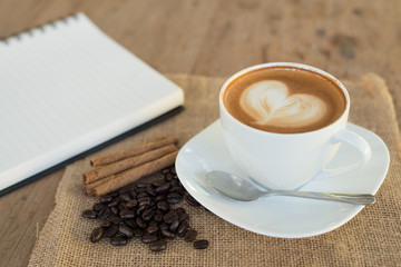 Cappuccino or latte coffee with heart shape