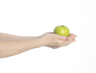 Hands with green apple