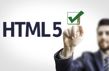 Fototapeta premium Business man pointing the text: HTML 5