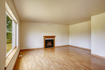Empty room with fireplace.