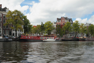 Obraz premium City channel and embankment. Amsterdam, Holland
