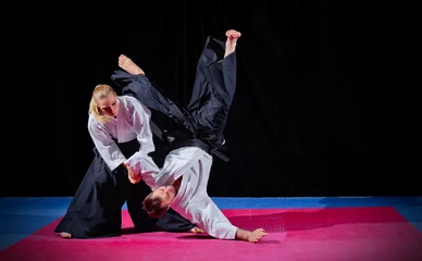 Fotobehang Vechtsporten Two martial arts fighters  © Boris Riaposov