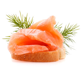 sandwich or canape with salmon on white background  cutout