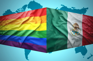 Waving Mexican and Gay flags