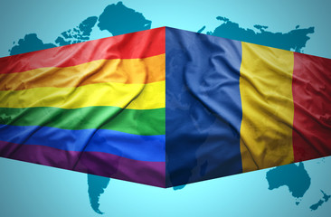 Waving Romanian and Gay flags