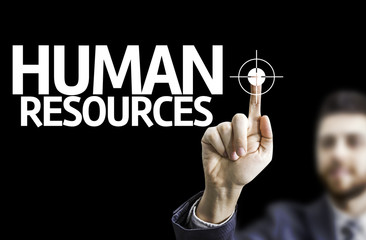 Business man pointing the text: Human Resources