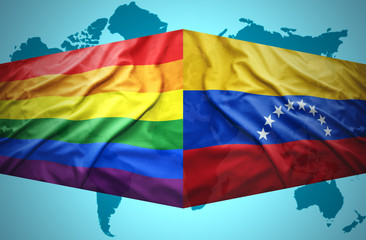 Waving Venezuelan and Gay flags