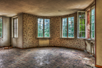 Dilapidated living room in an abandoned house