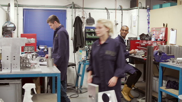 Time Lapse Sequence Of Busy Engineering Workshop