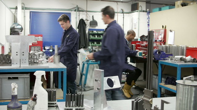 Time Lapse Sequence Of Busy Engineering Workshop