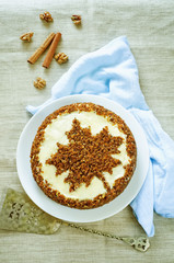 carrot cake with raisins, walnuts and butter cream