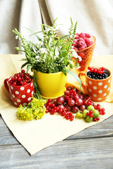 Still life with berries and flowers
