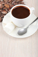 Obraz na płótnie Canvas Cup of hot chocolate on table, close up