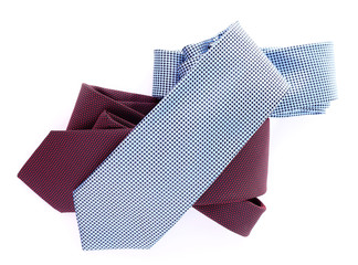 Brown and blue ties on white background isolated
