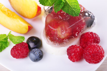 Strawberry jelly cake with fruits and berries