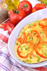 Casserole with vegetables in bowl  on table close-up
