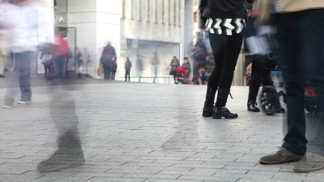 Time Lapse Sequence Of Shopper's Feet On Busy Street