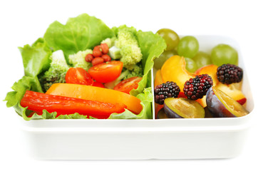 Tasty vegetarian food in plastic box, isolated on white