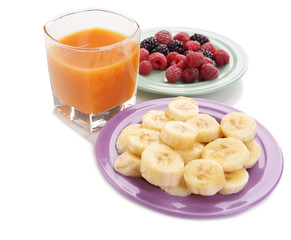 Slices of bananas with berries