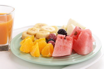 Slices of fruits with berries