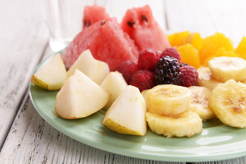 Sliced fruits and berries
