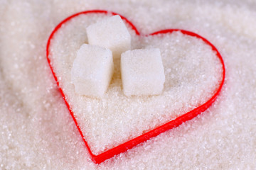 Heart covered in white sugar, close-up