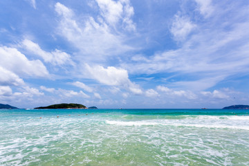 Closeup of sand and small wave