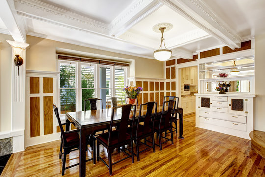 Empressive dining room interior. Luxury house with wood trim