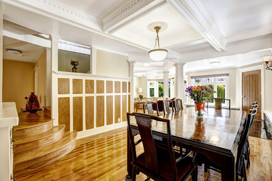 Empressive dining room interior. Luxury house with wood trim