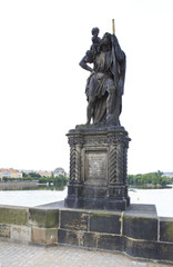 Fototapeta na wymiar Statue of St. Christopher. Charles Bridge in Prague.