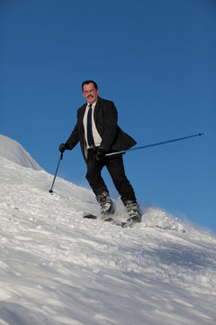 Man In Business Sute On Ski