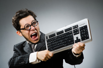 Comouter geek with computer keyboard