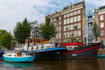 City view of Amsterdam canals and typical houses, Holland, Nethe