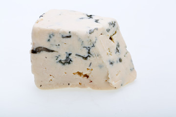 piece of blue cheese on white background