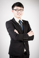 Successful young business man of Asian, full length portrait iso