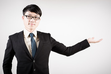 Successful young business man of Asian, full length portrait iso