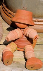 Terracotta flowerpot man © Arena Photo UK