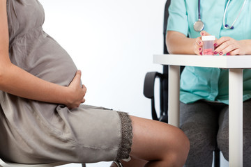 Fototapeta na wymiar Pregnant woman during medical appointment