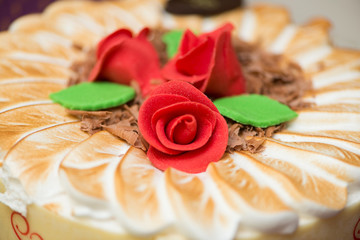 Topping of cake with cream