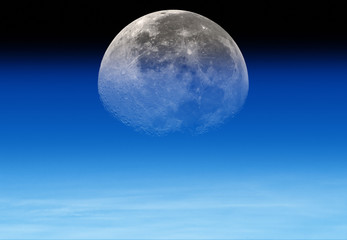 Moonrise behind the Earth's atmosphere.