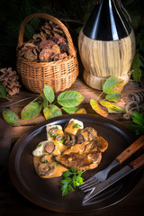 Steak with potato dumplings and forest mushroom sauce