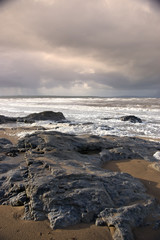 black rocks on Ballybunion beach