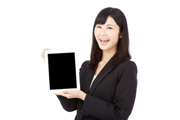 Fototapeta premium タブレットを持って笑うビジネスウーマン