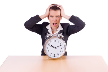 Businesswoman with clock missing her deadlines