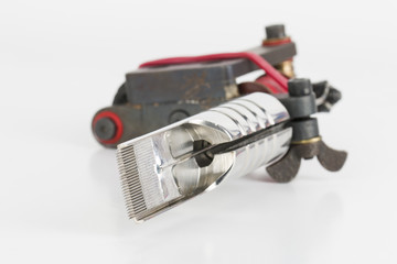 Tattoo machine ( gun ) and needle - Stock Image macro.